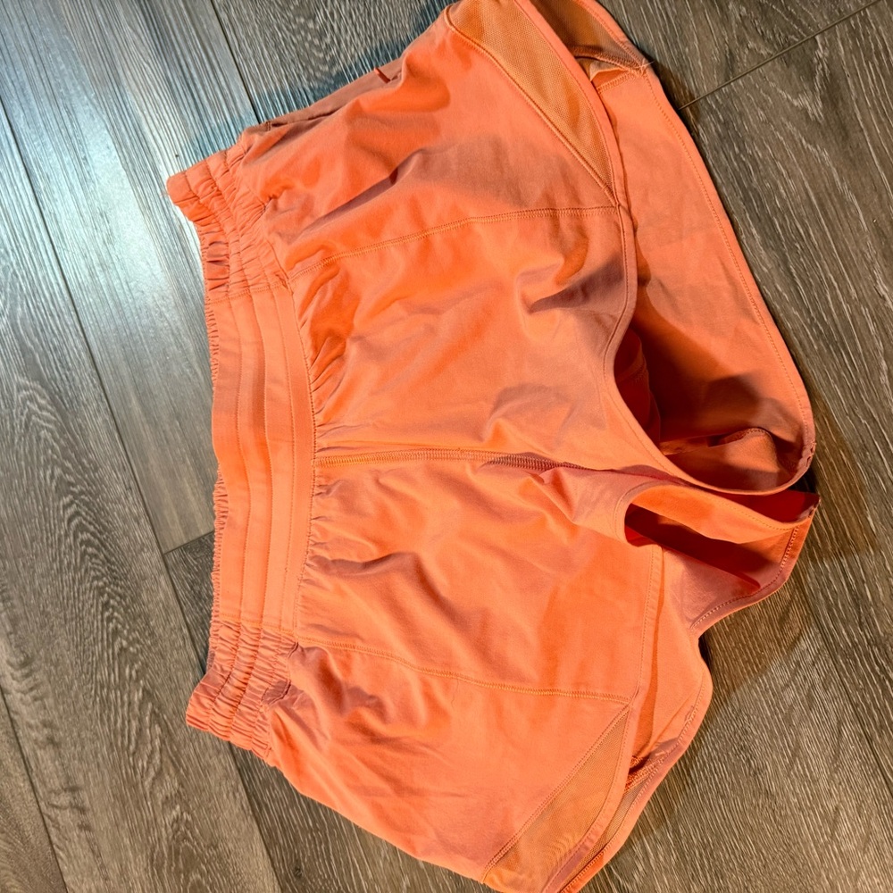 lululemon athletica Vibrant Orange Athletic Shorts 4”
